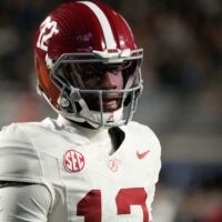 Nov 29, 2025; Auburn, Alabama, USA; Alabama quarterback Keelon Russell (12) warms up before the 2025 Iron Bowl game with Auburn Jordan-Hare Stadium.