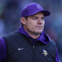 Nov 30, 2025; Seattle, Washington, USA; Minnesota Vikings head coach Kevin O'Connell looks on during warmups against the Seattle Seahawks at Lumen Field.