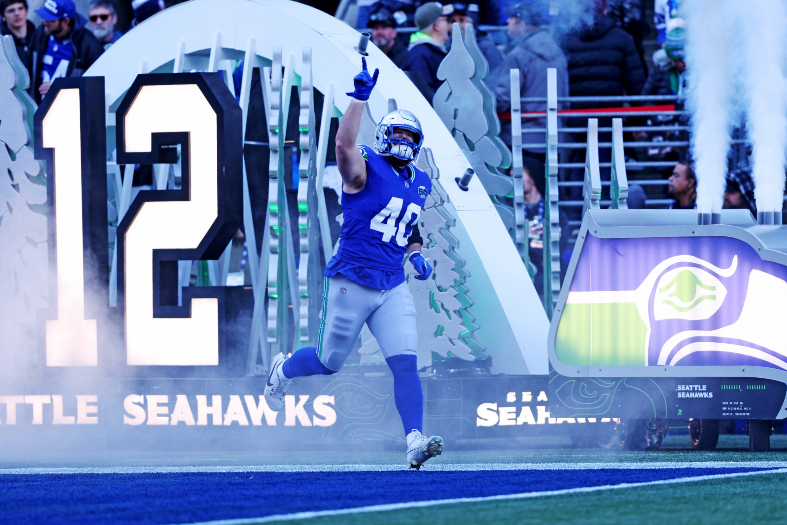 Nov 30, 2025; Seattle, Washington, USA; Seattle Seahawks fullback Robbie Ouzts (40) warms up before the game against the Minnesota Vikings at Lumen Field.