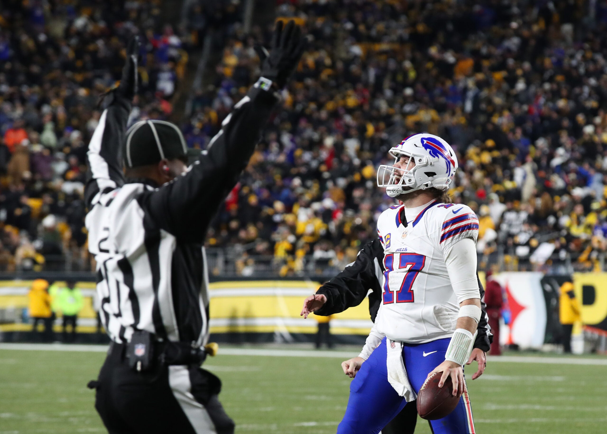 Nov 30, 2025; Pittsburgh, Pennsylvania, USA; Buffalo Bills quarterback Josh Allen (17) celebrates after scoring a touchdown during the fourth quarter against the Pittsburgh Steelers at Acrisure Stadium.