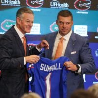UF Athletic Director Scott Stricklin and new UF head football coach Jon Sumrall pose with a jersey at a press conference James W. “Bill” Heavener Football Training Center in Gainesville, FL on Monday, December 1, 2025. Alan Youngblood/Gainesville Sun