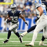 Dec 4, 2025; Detroit, Michigan, USA; Dallas Cowboys running back Javonte Williams (33) runs during the first half against the Detroit Lions at Ford Field.