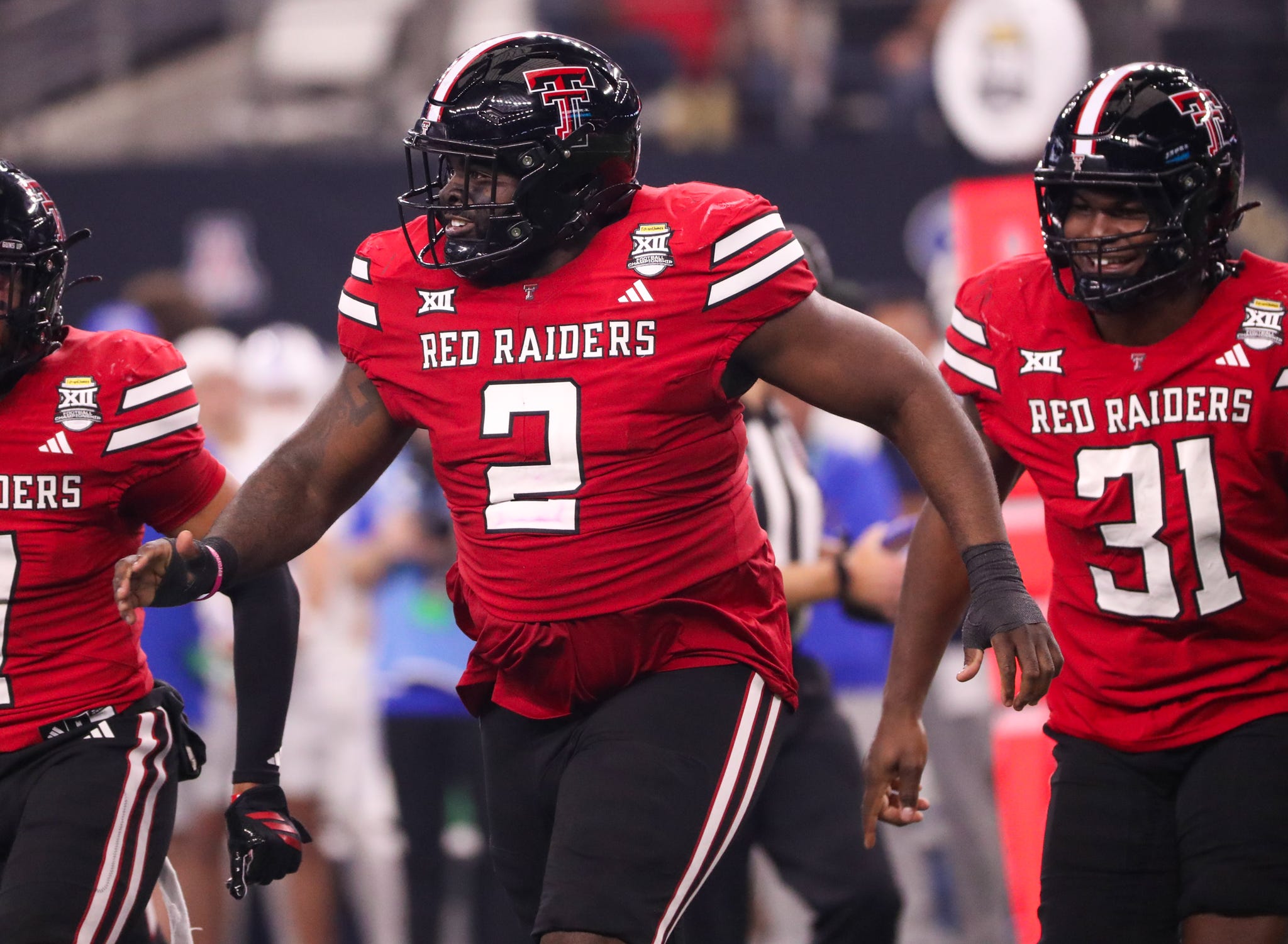 Texas Tech's Lee Hunter runs to the sideline after making a tackle against BYU during the Big 12 Conference championship football game, Saturday, Nov. 6, 2025, at AT&T Stadium in Arlington.