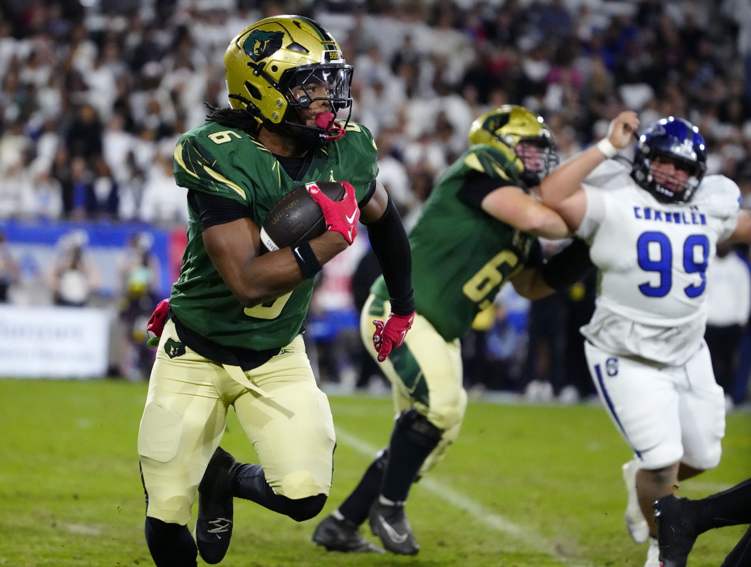 Basha running back Noah Roberts (6) runs against Chandler during the Open state championship at Mountain America Stadium in Tempe on Dec. 6, 2025.