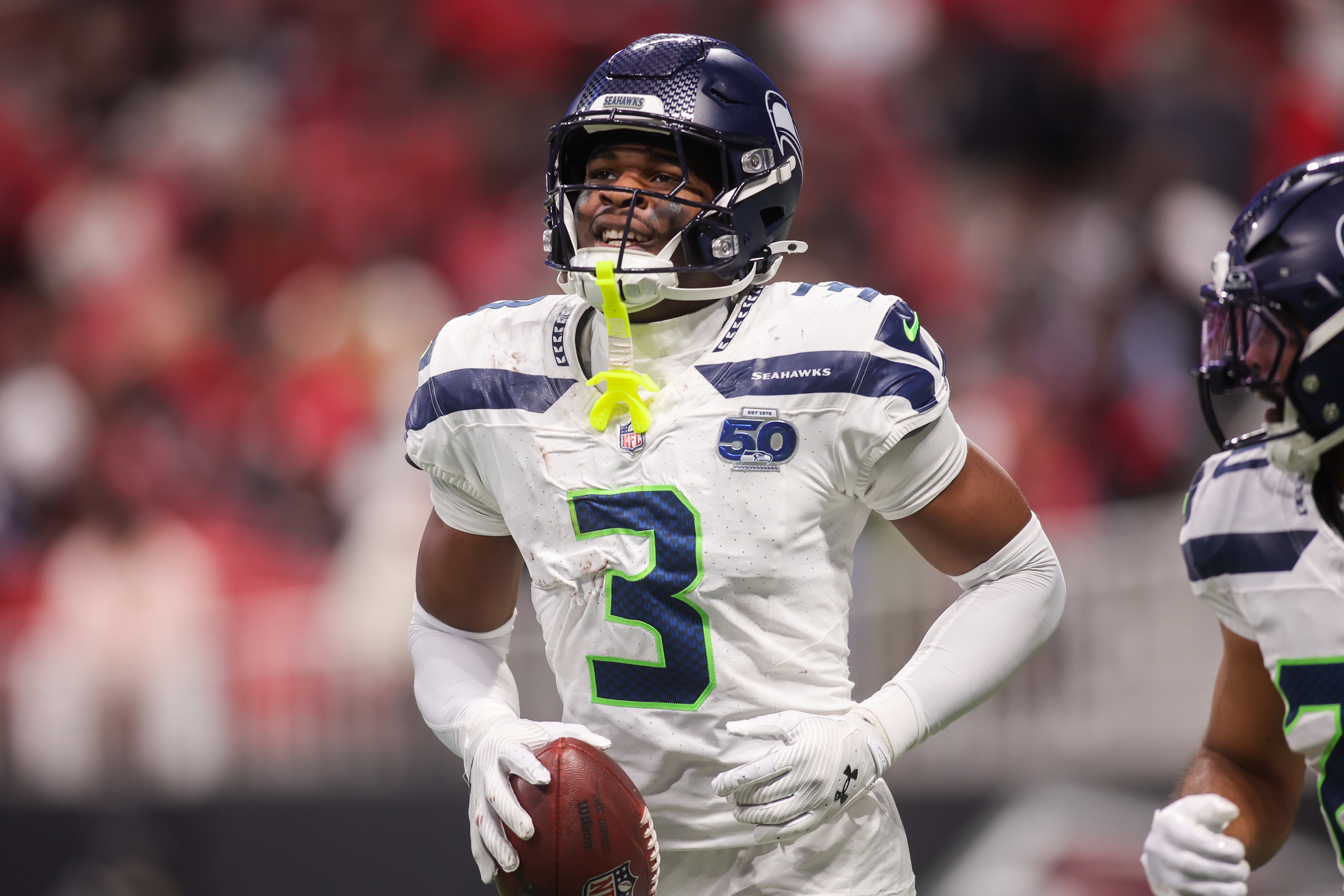 Dec 7, 2025; Atlanta, Georgia, USA; Seattle Seahawks safety Nick Emmanwori (3) celebrates after an interception against the Atlanta Falcons in the third quarter at Mercedes-Benz Stadium.