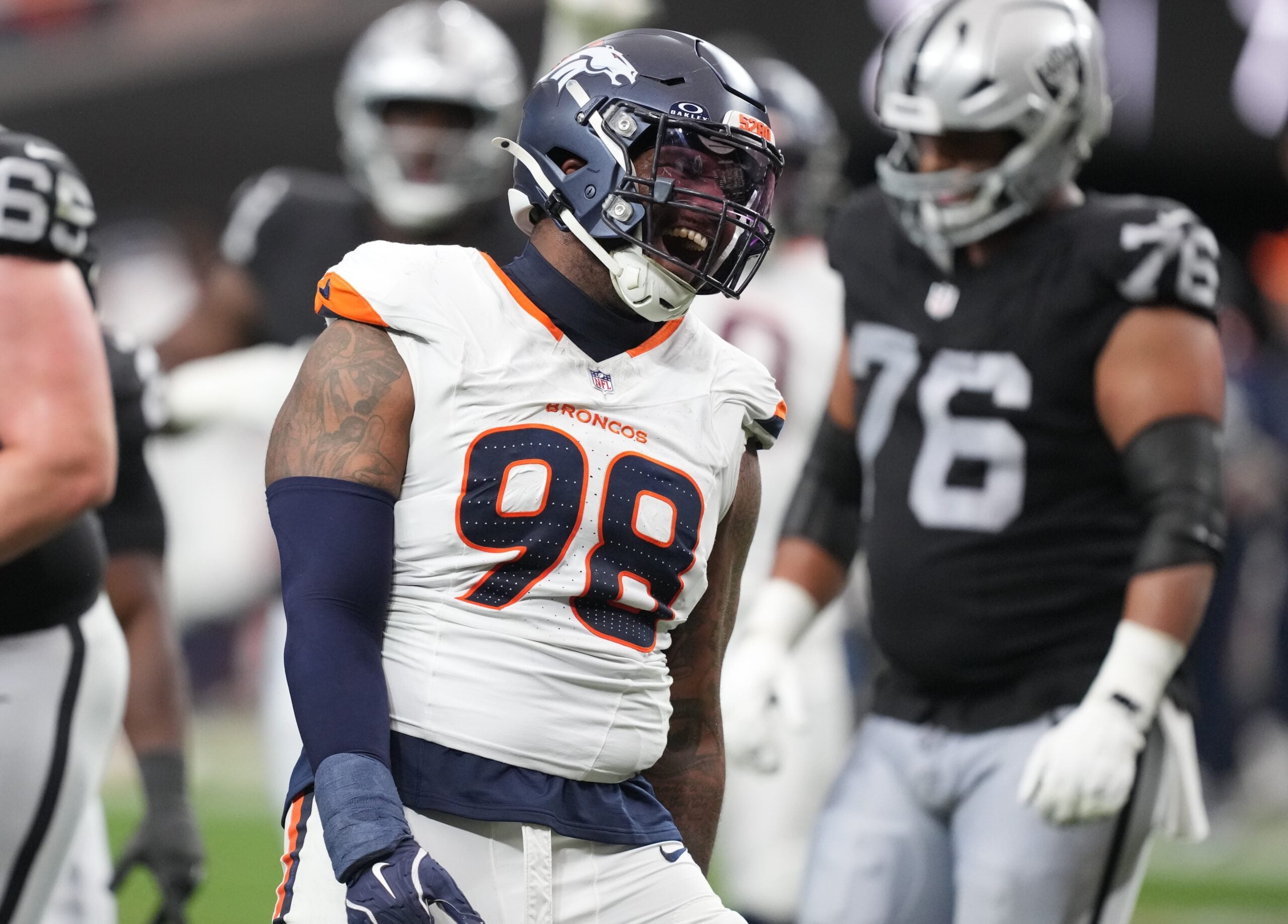 Dec 7, 2025; Paradise, Nevada, USA; Denver Broncos defensive end John Franklin-Myers (98) reacts after a sack against the Las Vegas Raiders during the first half at Allegiant Stadium.