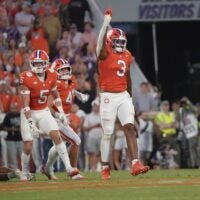 Clemson defensive end T.J. Parker (3) celebrates a tackle against Louisiana State University during the first quarter at Memorial Stadium in Clemson, S.C. Saturday, August 30, 2025.