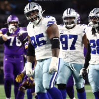 Dec 14, 2025; Arlington, Texas, USA; Dallas Cowboys defensive tackle Kenny Clark (95) celebrates after a play during the first half against the Minnesota Vikings at AT&T Stadium.