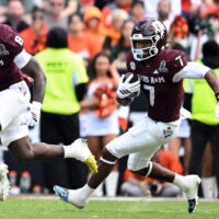 Dec 20, 2025; College Station, TX, USA; Texas A&M Aggies wide receiver KC Concepcion (7) runs the ball against the Miami Hurricanes during the second half at Kyle Field.