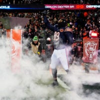 Dec 20, 2025; Chicago, Illinois, USA; Chicago Bears defensive tackle Gervon Dexter Sr. (99) acknowledges the crowd during player introductions before the game against the Green Bay Packers at Soldier Field.