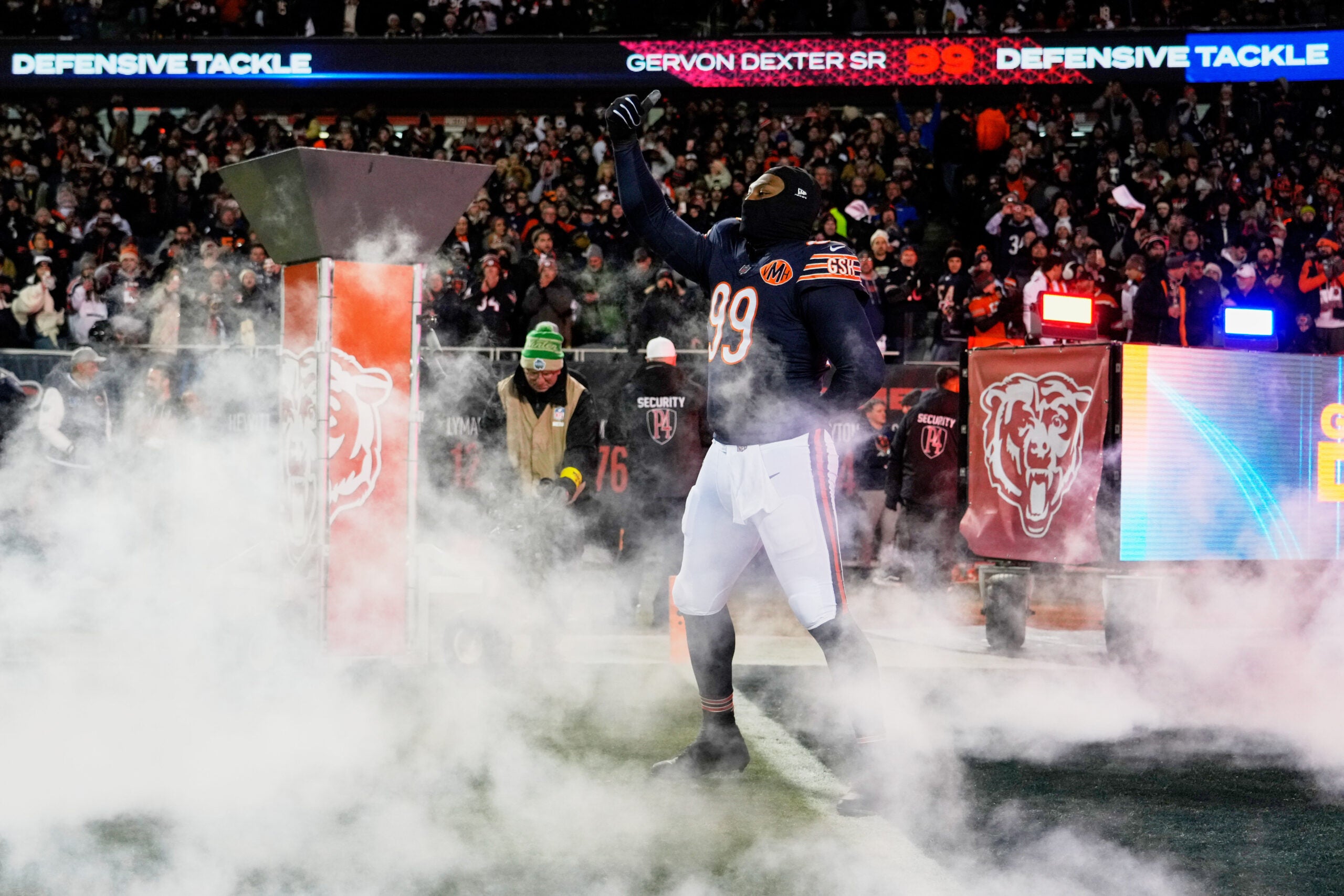 Dec 20, 2025; Chicago, Illinois, USA; Chicago Bears defensive tackle Gervon Dexter Sr. (99) acknowledges the crowd during player introductions before the game against the Green Bay Packers at Soldier Field.
