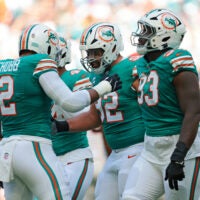 Dec 21, 2025; Miami Gardens, Florida, USA; Miami Dolphins linebacker Bradley Chubb (2) celebrates after sacking Cincinnati Bengals quarterback Joe Burrow (9) during the first quarter at Hard Rock Stadium.