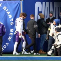 Dec 21, 2025; East Rutherford, New Jersey, USA; Minnesota Vikings quarterback J.J. McCarthy (9) is taken to the locker room after a hit against the New York Giants during the first half at MetLife Stadium.