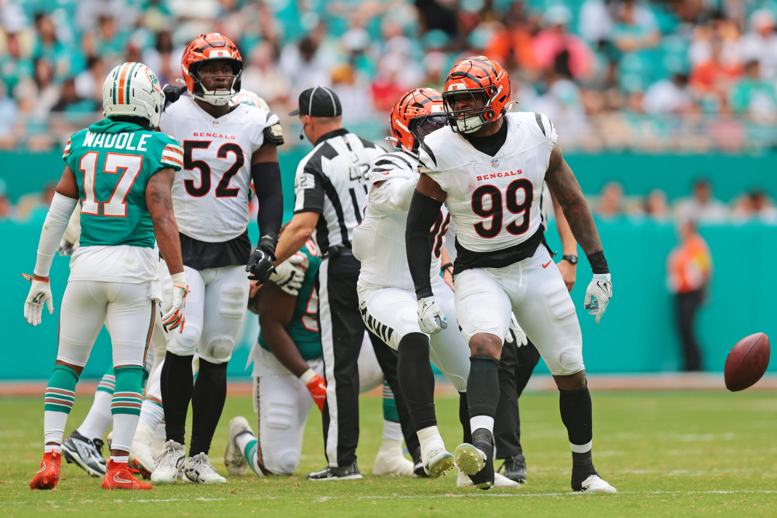 Dec 21, 2025; Miami Gardens, Florida, USA; Cincinnati Bengals defensive end Myles Murphy (99) reacts after a play during the third quarter against the Miami Dolphins at Hard Rock Stadium.