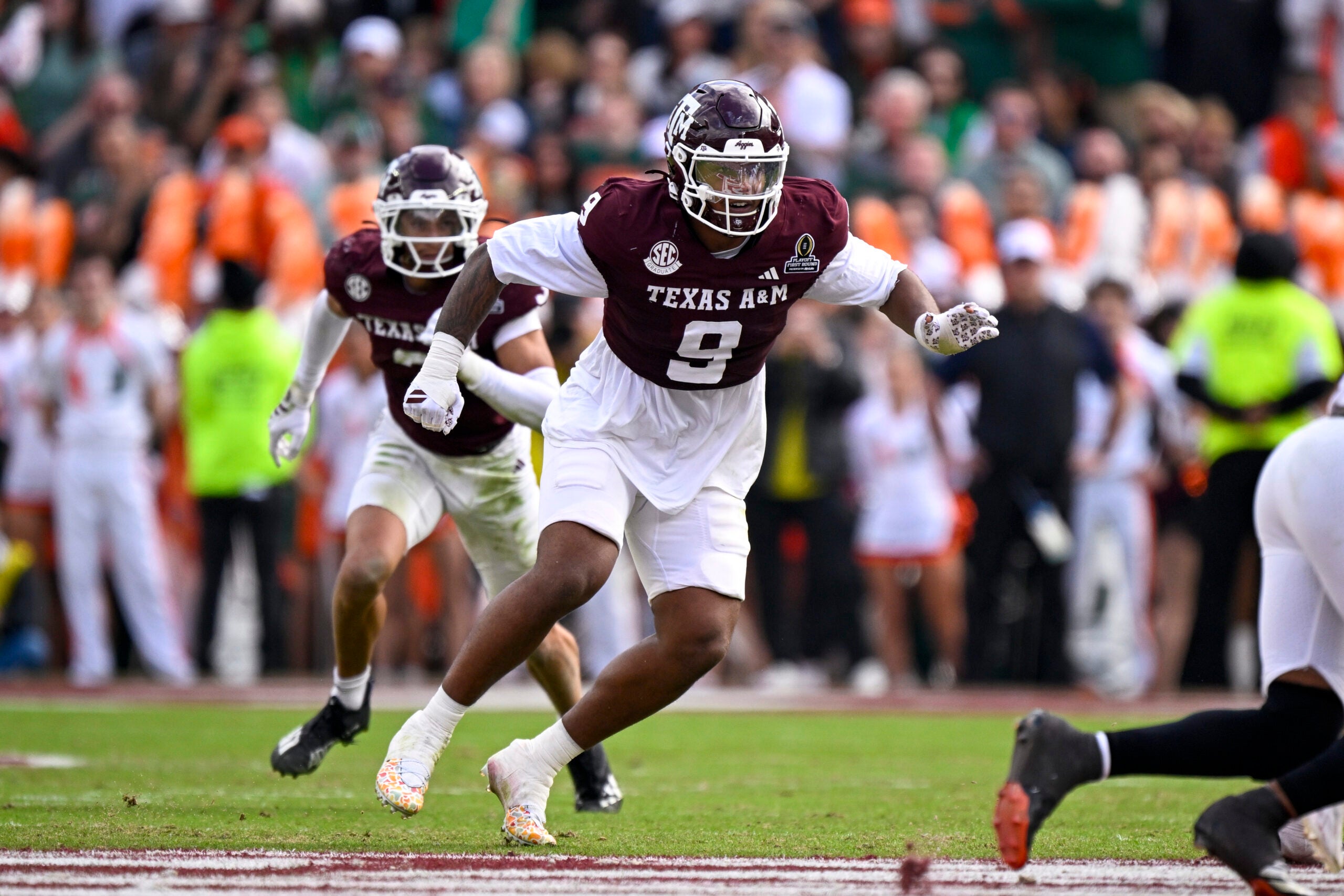 Dec 20, 2025; College Station, TX, USA; Texas A&M Aggies defensive end Cashius Howell (9) rushes the line during the game between the Aggies and the Hurricanes at Kyle Field.
