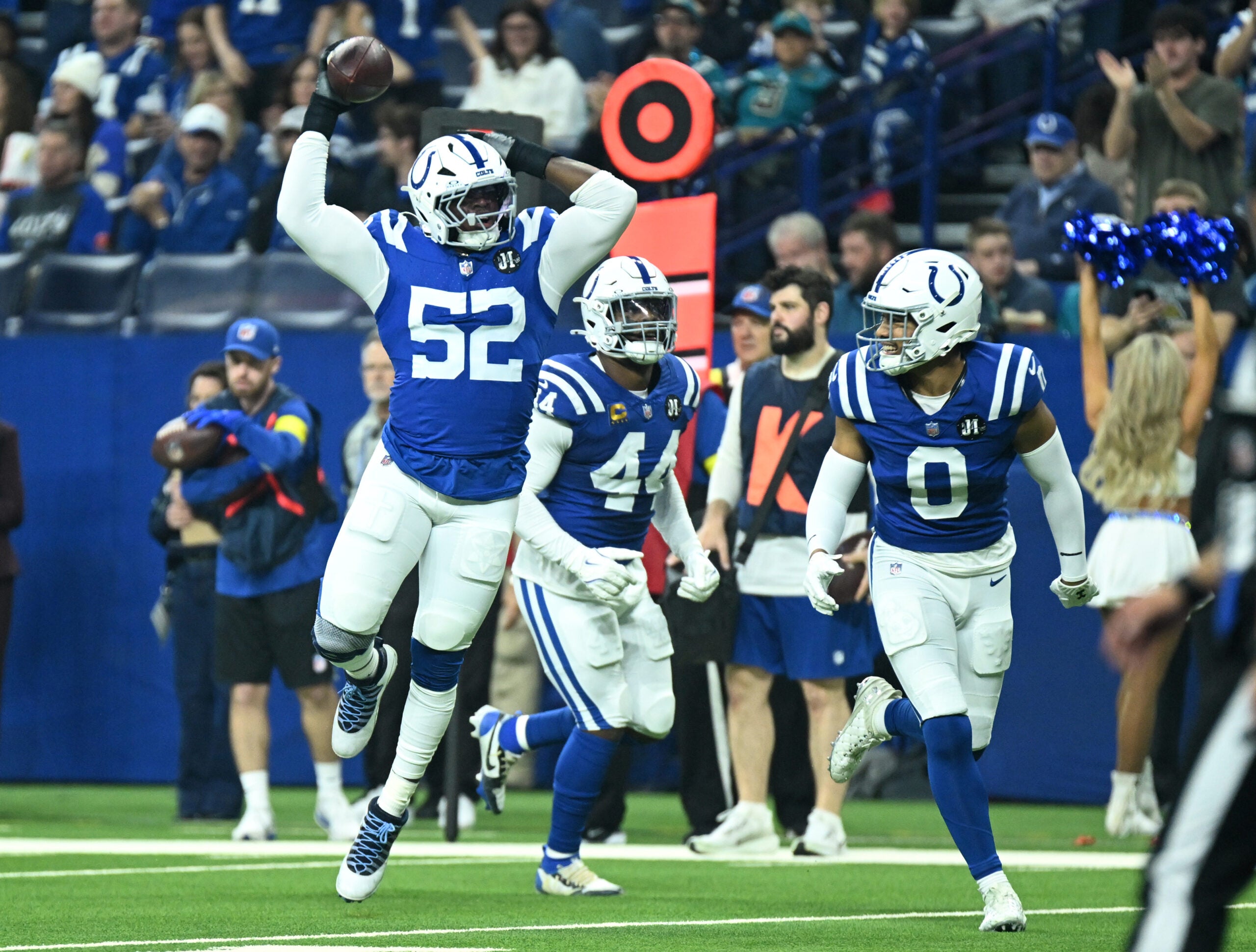Colts defenders Samson Ebukam, Zaire Franklin and Cam Bynum celebrate a turnover