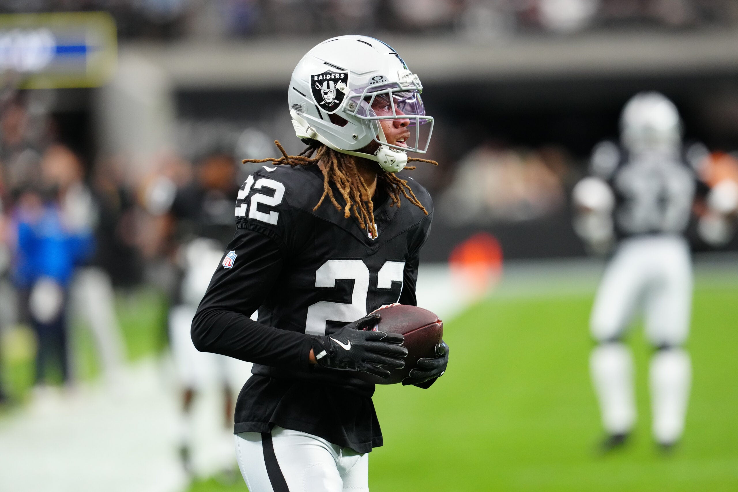 Dec 28, 2025; Paradise, Nevada, USA; Las Vegas Raiders cornerback Eric Stokes (22) warms up before the game against the New York Giants at Allegiant Stadium.