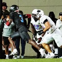 Team Roses' Easton Royal (3) runs into the end zone for a touchdown during the Under Armour All-America Game Saturday, Jan. 3, 2026 at Spec Martin Stadium in DeLand.