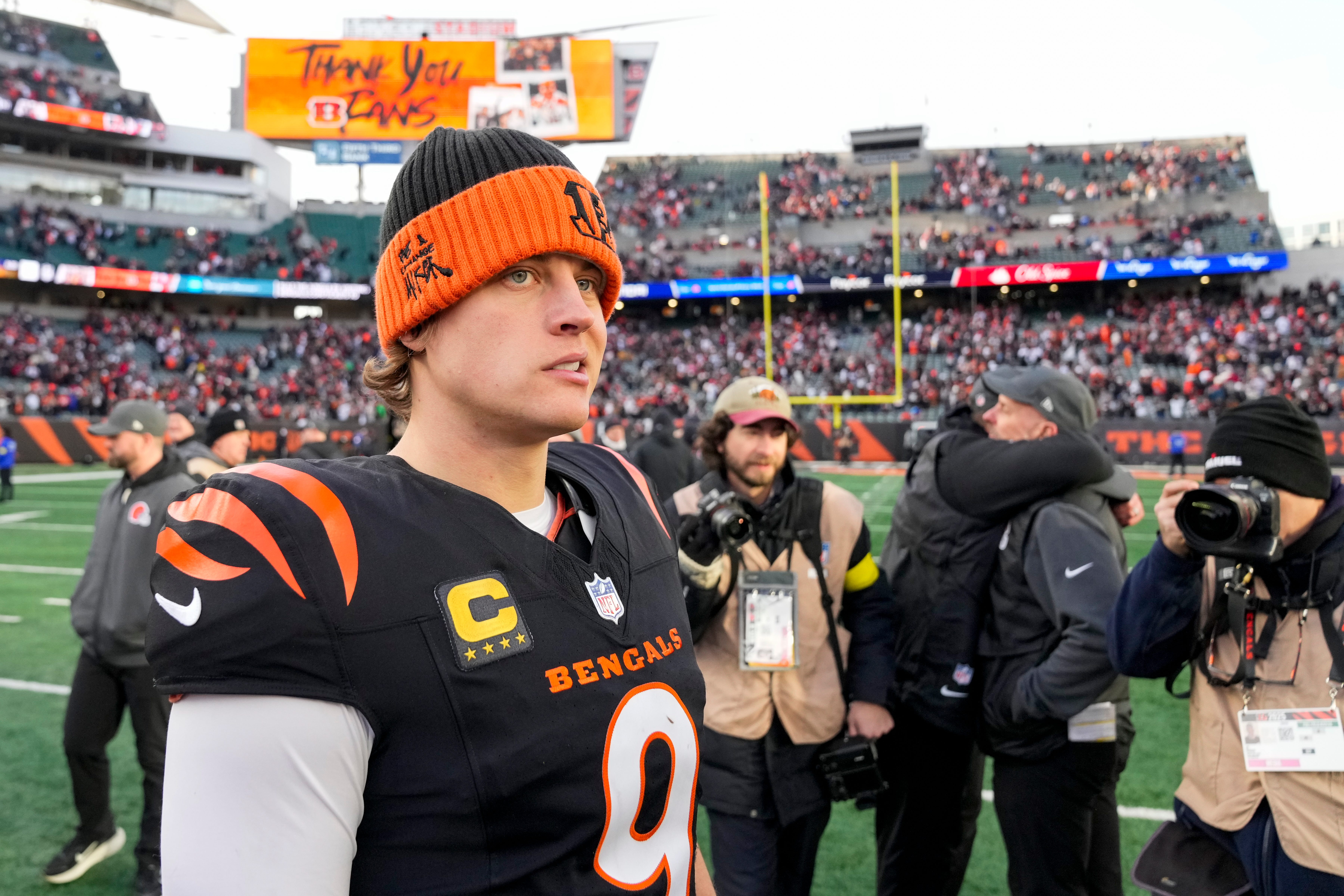 Cincinnati Bengals quarterback Joe Burrow (9) looks for hands to shake after the fourth quarter of the NFL Week 18 game between the Cincinnati Bengals and the Cleveland Browns at Paycor Stadium in Downtown Cincinnati on Sunday, Jan. 4, 2026. The Browns kicked a last second field goal to win 20-18.