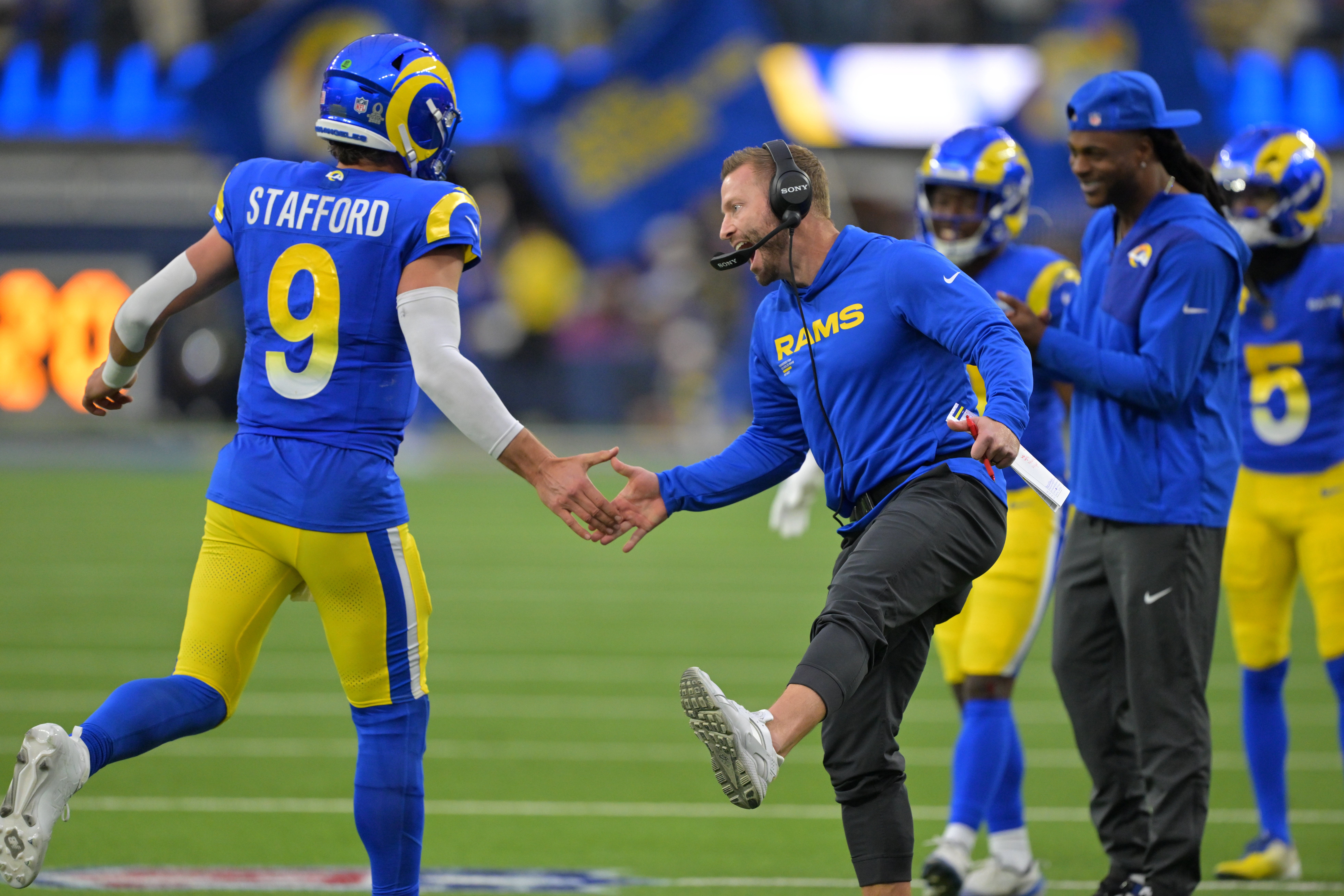 Jan 4, 2026; Inglewood, California, USA; Los Angeles Rams head coach Sean McVay reacts with quarterback Matthew Stafford (9) after a touchdown against the Arizona Cardinals during the second half at SoFi Stadium.