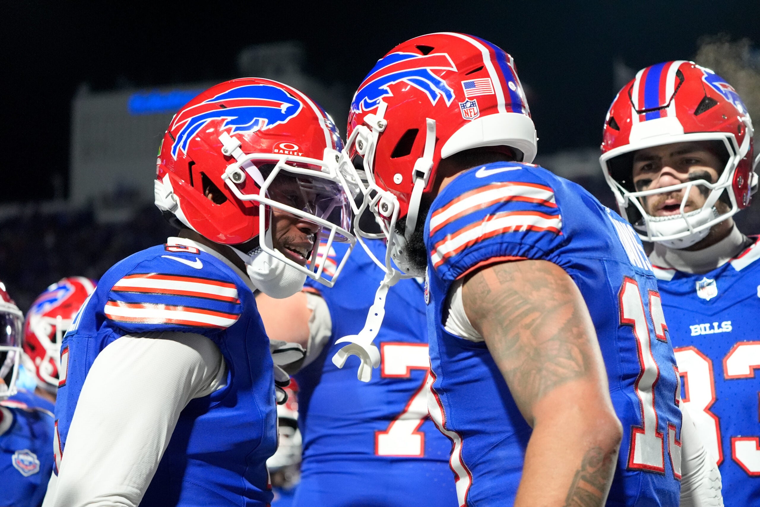 Jan 4, 2026; Orchard Park, New York, USA; Buffalo Bills wide receiver Gabe Davis (13) celebrates with wide receiver Joshua Palmer (5) after scoring a touchdown against the New York Jets during the third quarter at Highmark Stadium.
