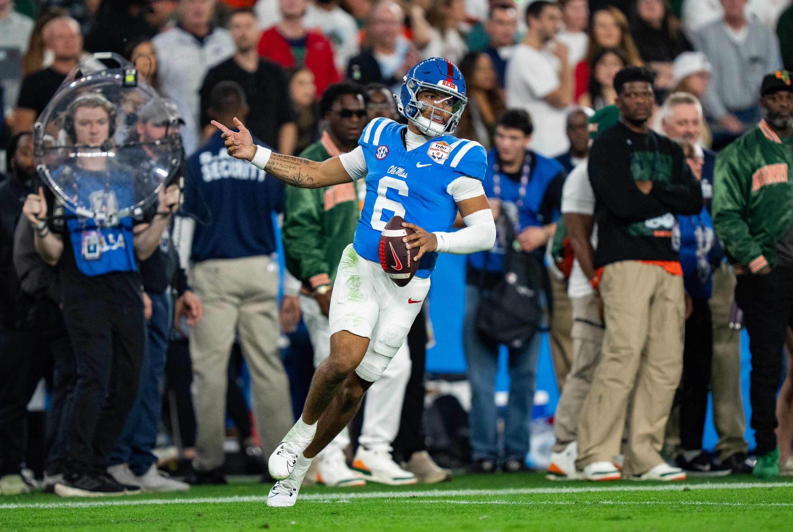 Ole Miss quarterback Trinidad Chambliss (6) celebrates a play during the CFP Fiesta Bowl against Miami at the State Farm Stadium, in Glendale, Ariz., on Thursday, Jan. 8, 2026.