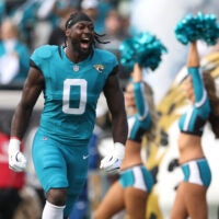 Jan 11, 2026; Jacksonville, FL, USA; Jacksonville Jaguars linebacker Devin Lloyd (0) runs on the field before an AFC Wild Card Round game against the Buffalo Bills at EverBank Stadium.