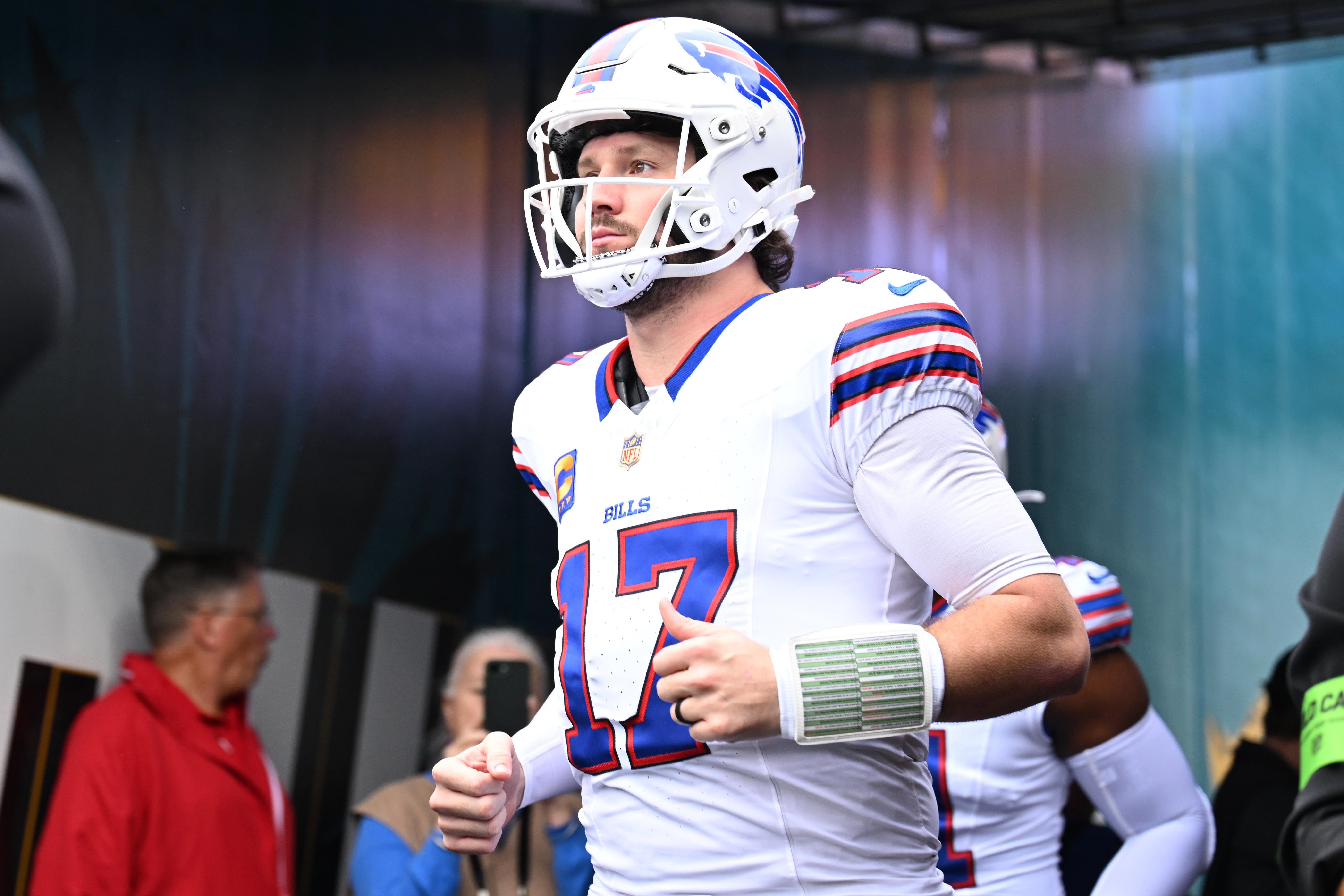 Jan 11, 2026; Jacksonville, FL, USA; Buffalo Bills quarterback Josh Allen (17) runs on to the field before an AFC Wild Card Round game against the Jacksonville Jaguars at EverBank Stadium.