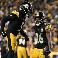 Jan 12, 2026; Pittsburgh, PA, USA; Pittsburgh Steelers cornerback Brandin Echols (26) and cornerback Jalen Ramsey (5) celebrate after a play during the second half of an AFC Wild Card Round game against the Houston Texans at Acrisure Stadium.