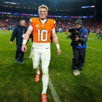 Jan 17, 2026; Denver, CO, USA; Denver Broncos quarterback Bo Nix (10) reacts after winning an AFC Divisional Round playoff game against the Buffalo Bills at Empower Field at Mile High.