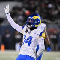 Jan 18, 2026; Chicago, IL, USA; Los Angeles Rams cornerback Cobie Durant (14) reacts to a rushing touchdown scored by running back Kyren Williams (not pictured) against the Chicago Bears during the fourth quarter of an NFC Divisional Round game at Soldier Field.