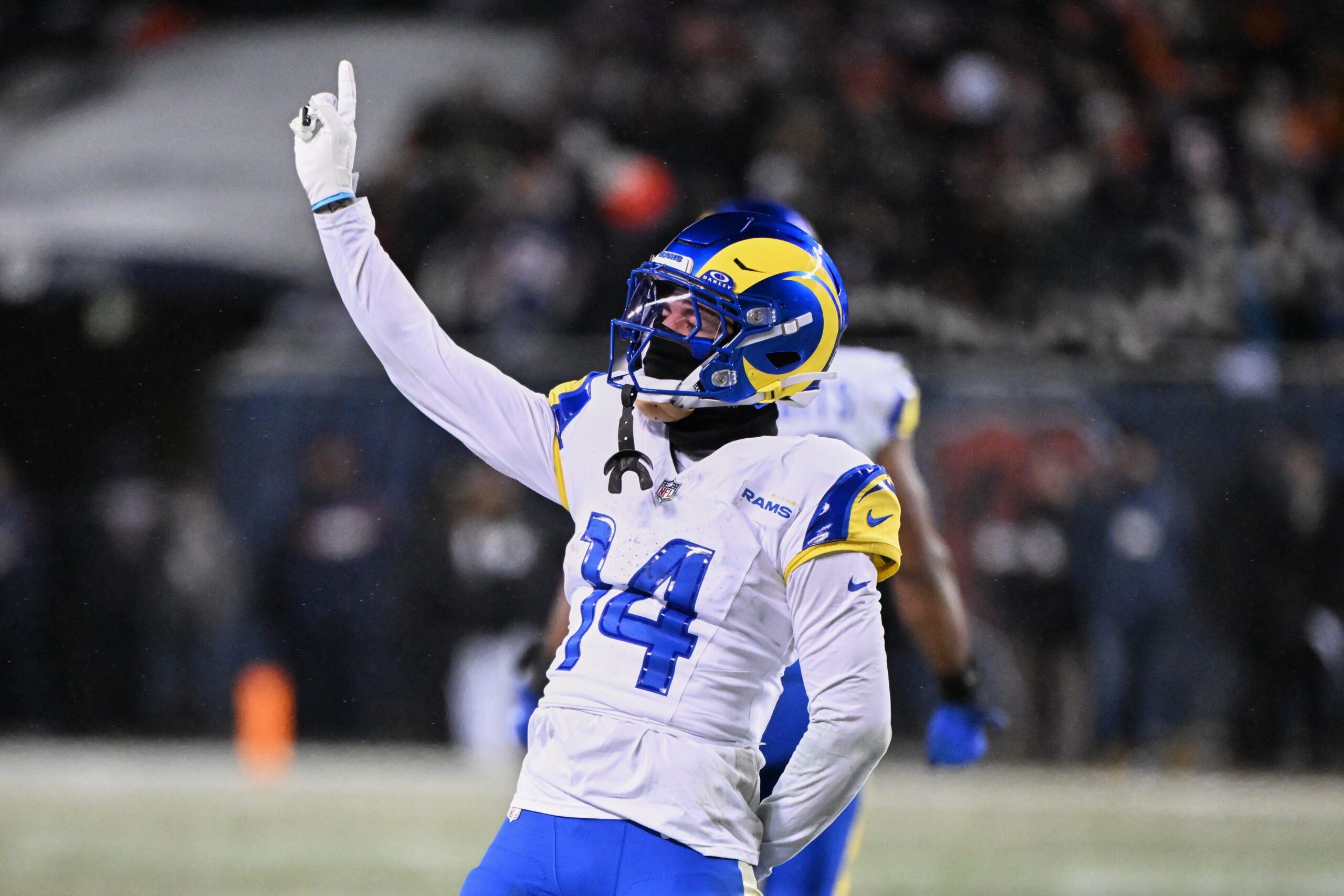 Jan 18, 2026; Chicago, IL, USA; Los Angeles Rams cornerback Cobie Durant (14) reacts to a rushing touchdown scored by running back Kyren Williams (not pictured) against the Chicago Bears during the fourth quarter of an NFC Divisional Round game at Soldier Field.