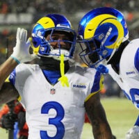 Jan 18, 2026; Chicago, IL, USA; Los Angeles Rams safety Kam Curl (3) acknowledges the crowd with safety Kamren Kinchens (26) after intercepting a pass intended for Chicago Bears wide receiver DJ Moore (not pictured) during overtime of an NFC Divisional Round game at Soldier Field.