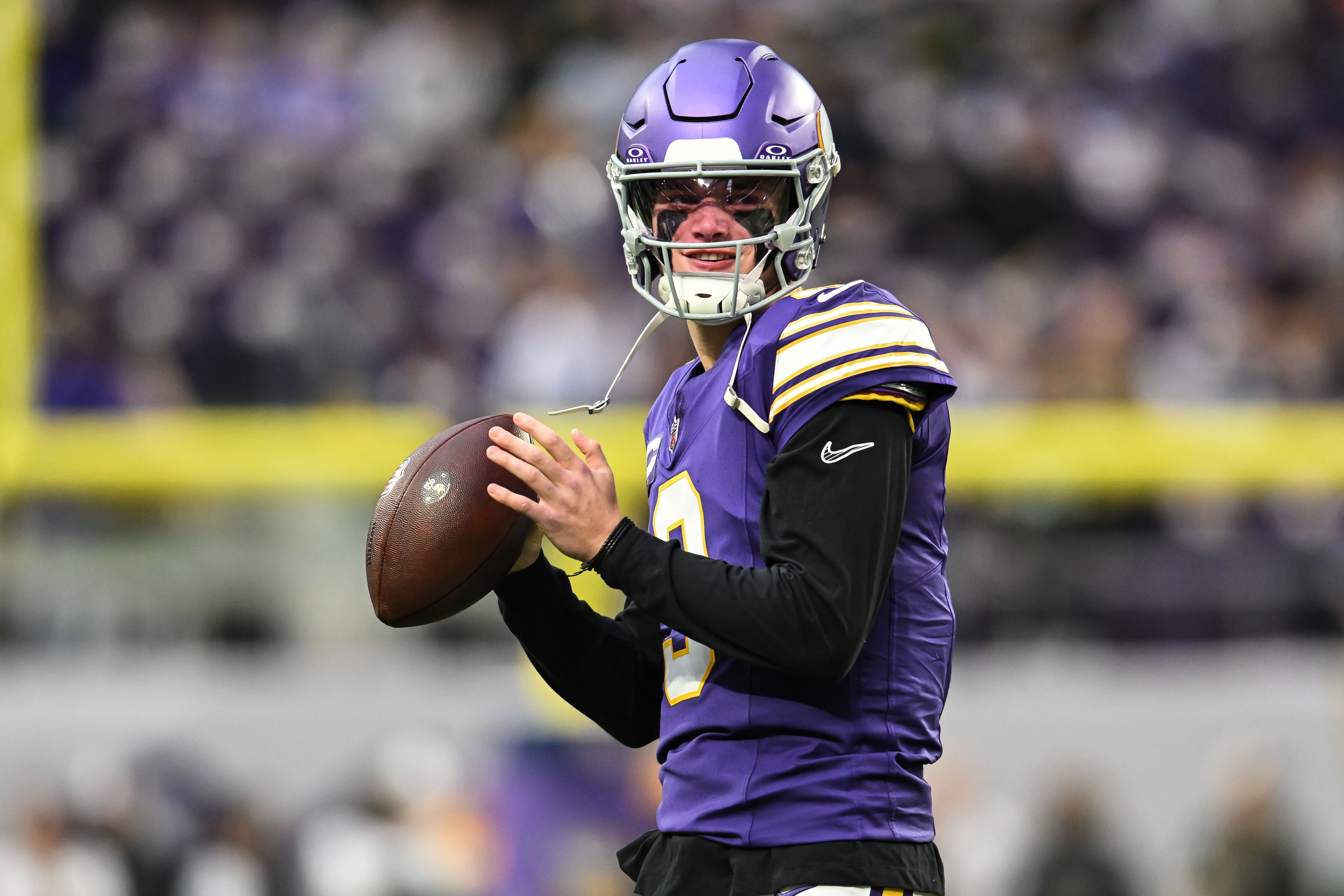 Jan 4, 2026; Minneapolis, Minnesota, USA; Minnesota Vikings quarterback J.J. McCarthy (9) warms up before the game against the Green Bay Packers at U.S. Bank Stadium.