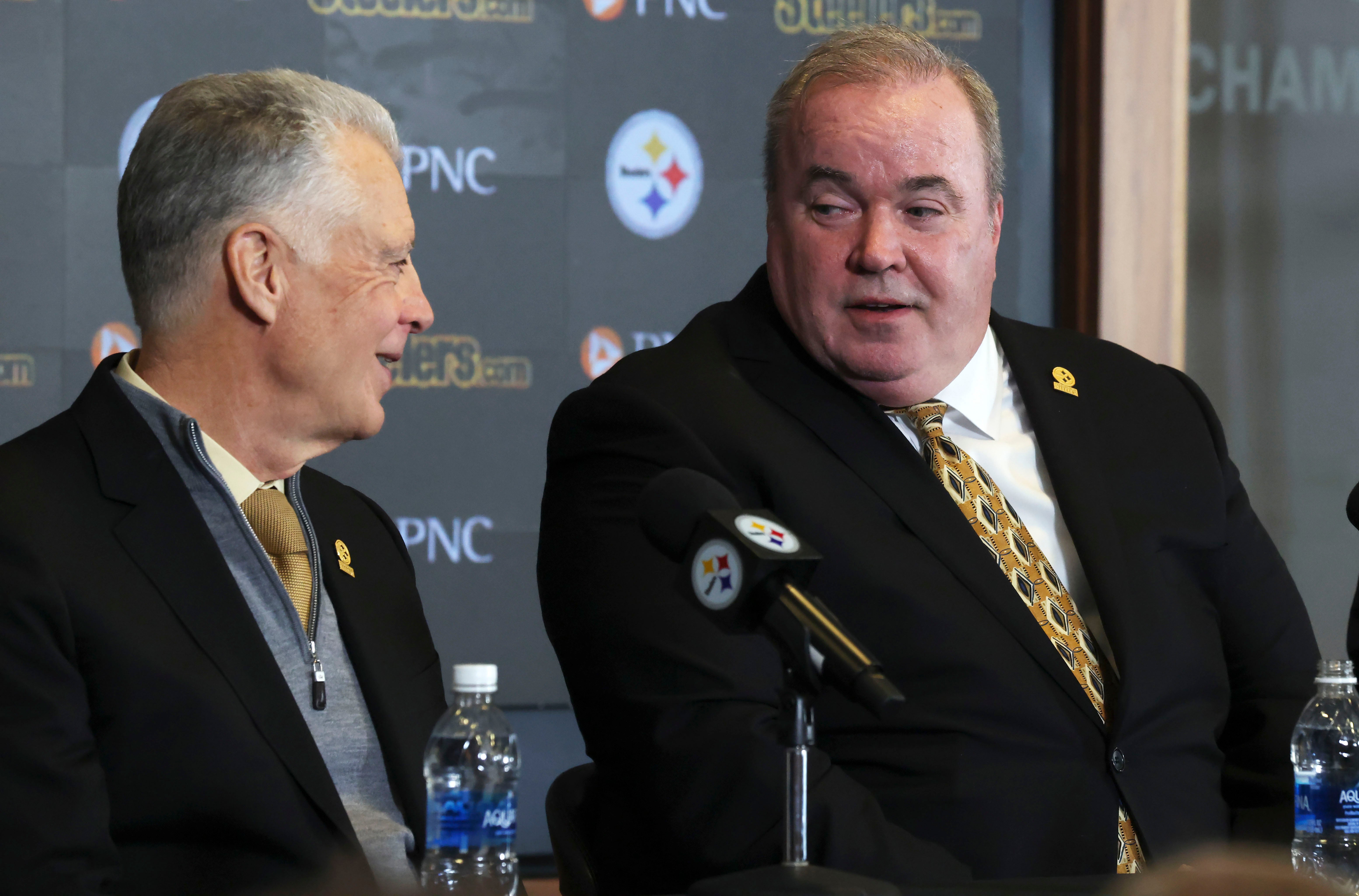 Jan 27, 2026; Pittsburgh, PA, USA; Pittsburgh Steelers owner Art Rooney II (left) talks with Mike McCarthy (right) at a press conference introducing McCarthy as the new Pittsburgh Steelers head coach at PNC Champions Club at Acrisure Stadium.
