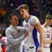 Florida head coach Todd Golden, left, congratulates Florida forward Alex Condon (21) during the second half of an NCAA Mens basketball game at Steven C. O'Connell Center Exactek arena in Gainesville, FL on Sunday, February 1, 2026. Florida beat Alabama 100-77.