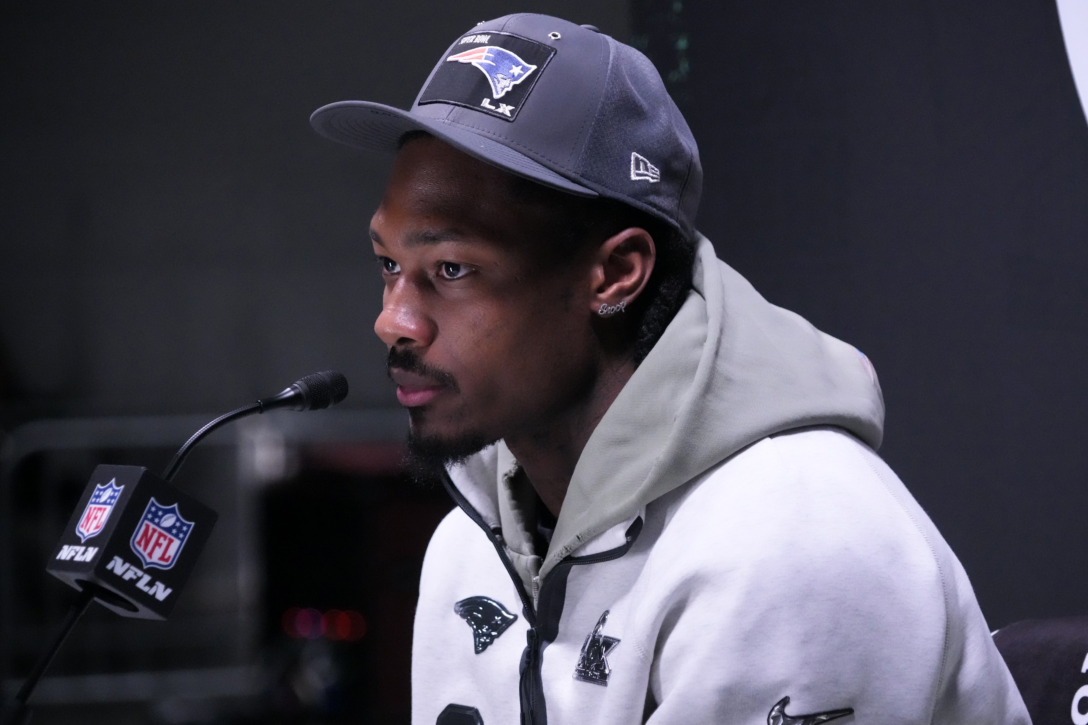Feb 2, 2026; San Jose, CA, USA; New England Patriots wide receiver Stefon Diggs (8) speaks to the media during Opening Night for Super Bowl LX at San Jose Convention Center.