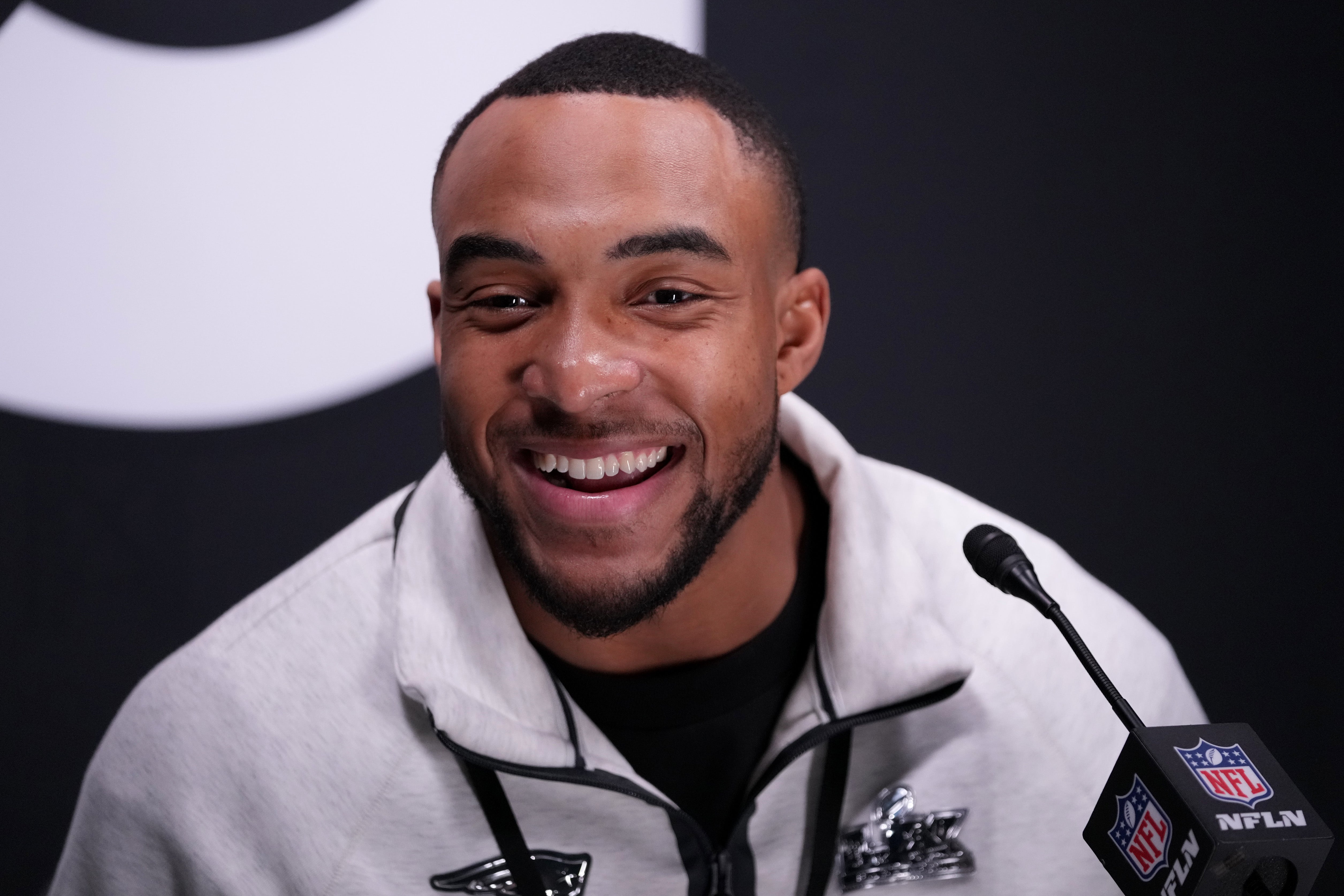 Feb 2, 2026; San Jose, CA, USA; New England Patriots running back TreVeyon Henderson (32) speaks to media during Opening Night for Super Bowl LX at San Jose Convention Center.