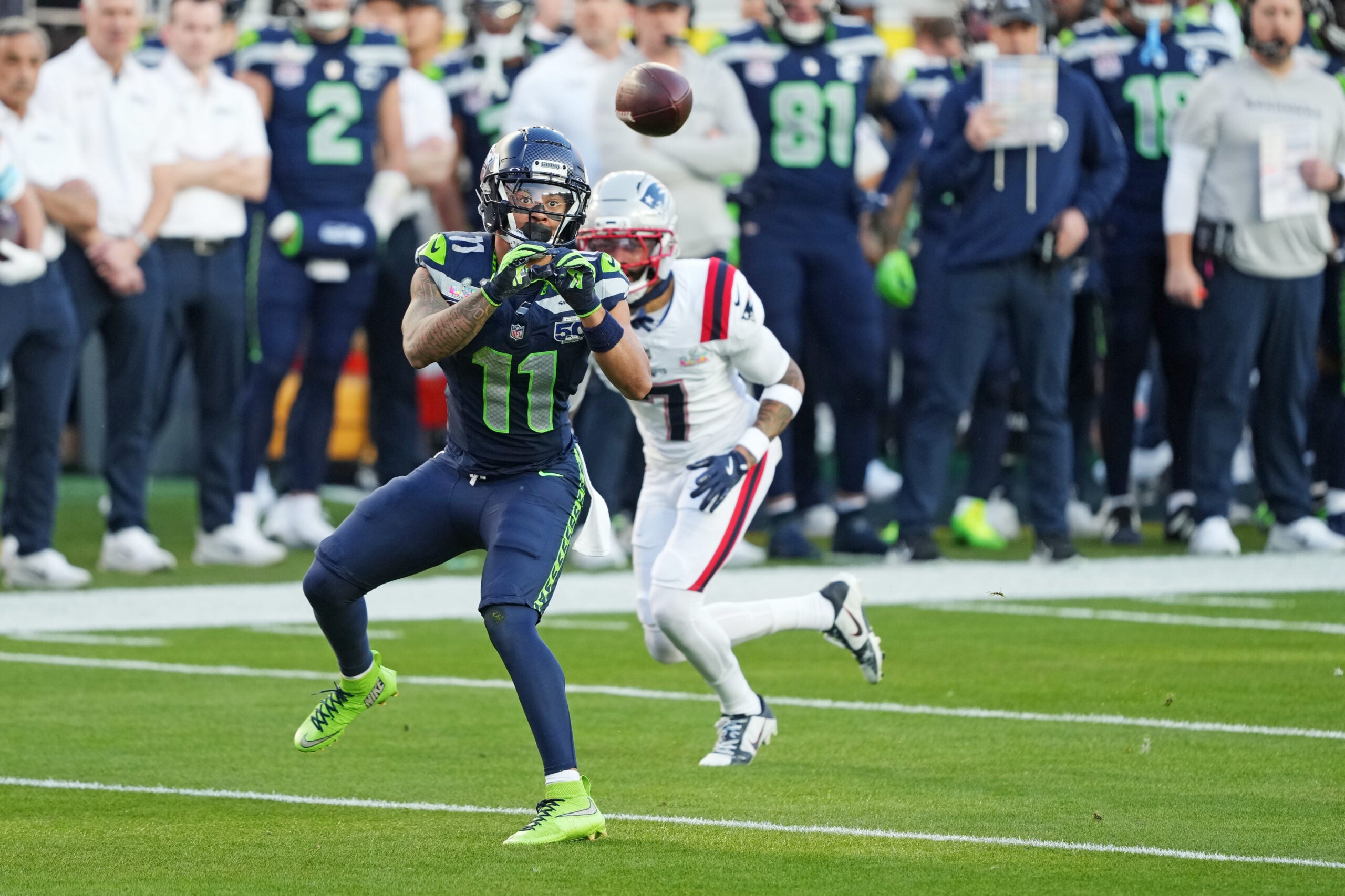 Feb 8, 2026; Santa Clara, CA, USA; Seattle Seahawks wide receiver Jaxon Smith-Njigba (11) makes a c atch against New England Patriots cornerback Carlton Davis III (7) during the first quarter in Super Bowl LX at Levi's Stadium.