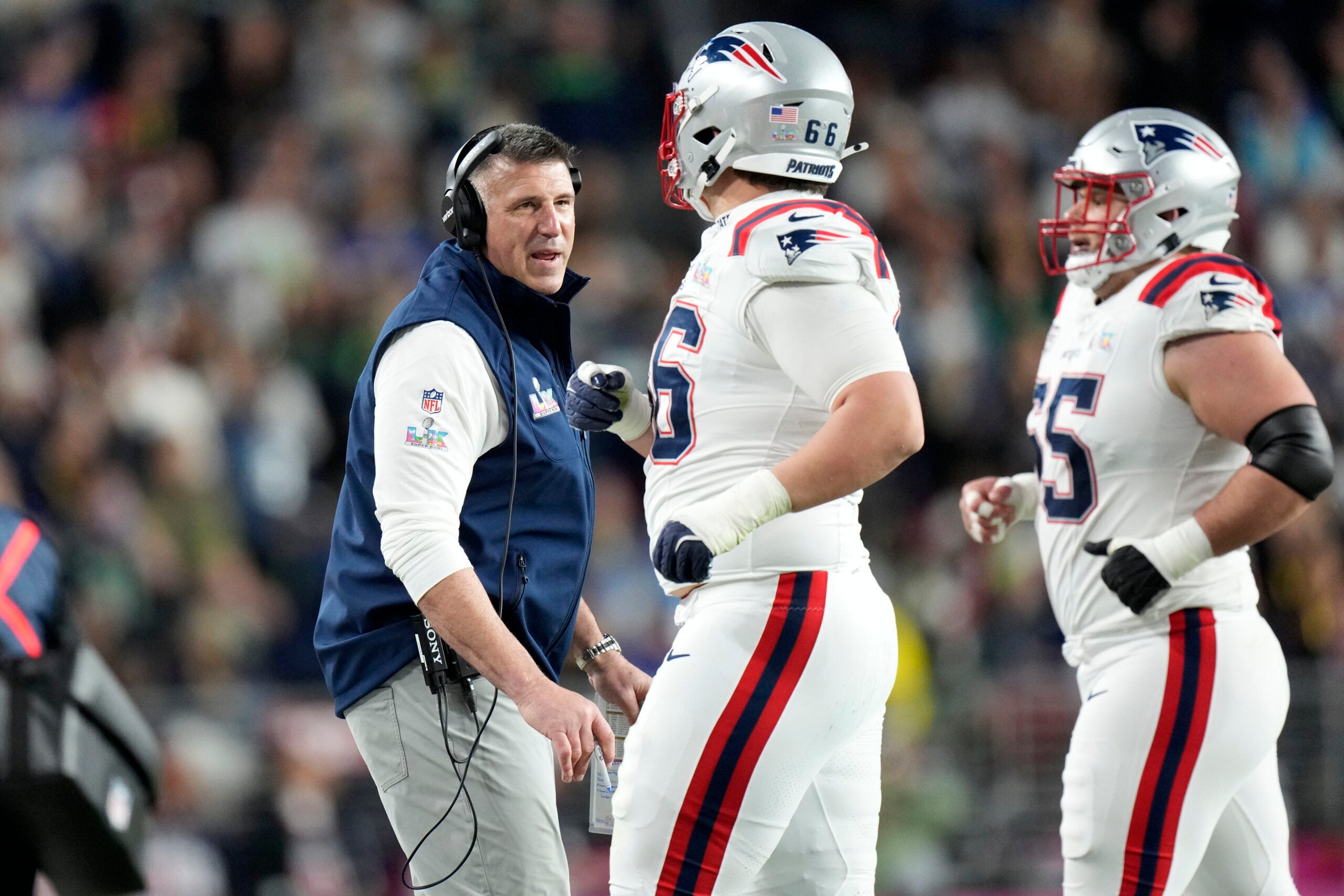 Feb 8, 2026; Santa Clara, CA, USA; New England Patriots head coach Mike Vrabel talks with offensive tackle Will Campbell (66) during the third quarter against the Seattle Seahawks in Super Bowl LX at Levi's Stadium.