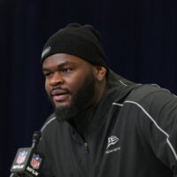Feb 25, 2026; Indianapolis, IN, USA; Florida defensive lineman Caleb Banks (DL02) speaks during the NFL Scouting Combine at the Indiana Convention Center.