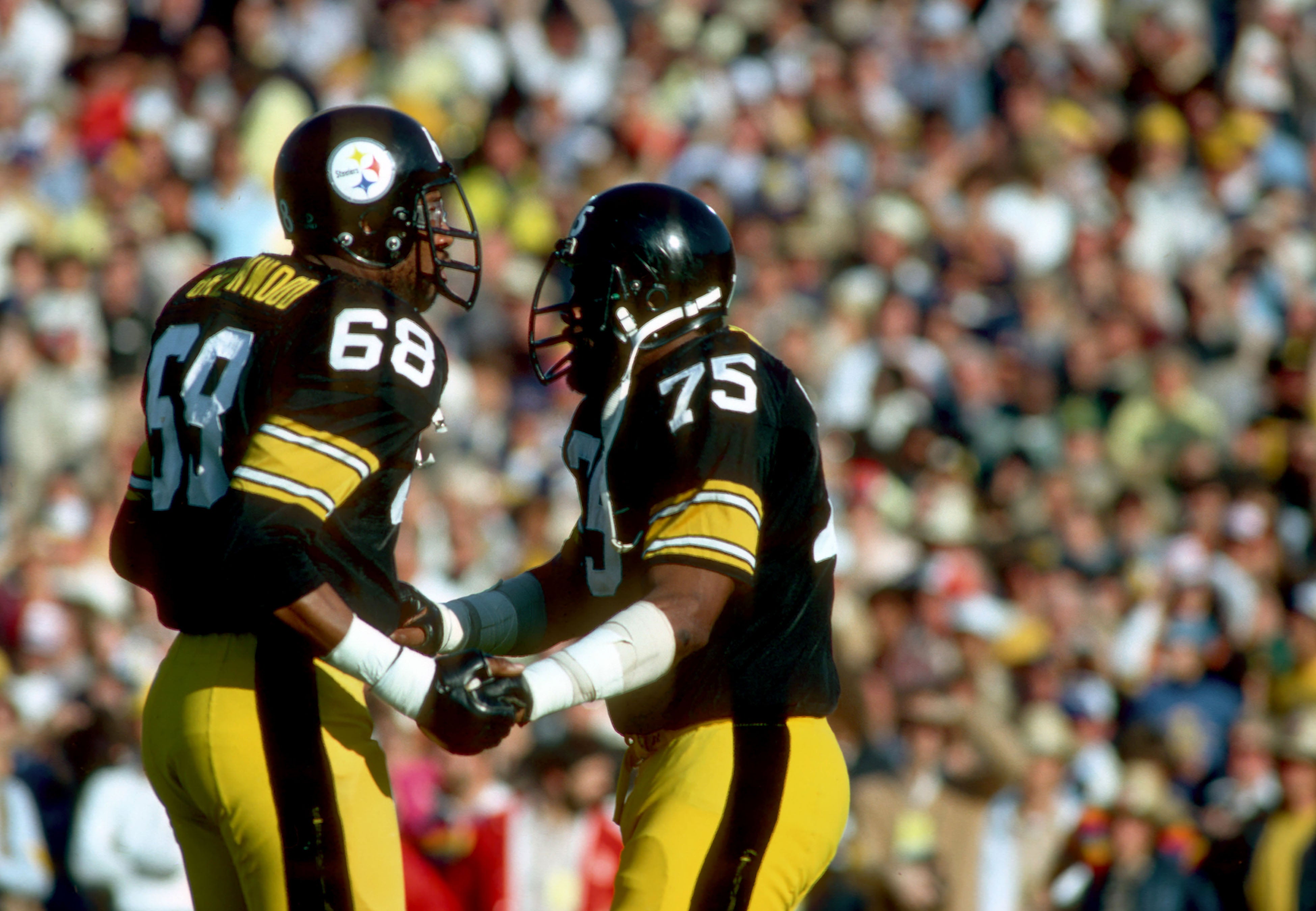 Jan 20, 1980; Pasadena, CA, USA; FILE PHOTO; Pittsburgh Steelers defensive tackle (75) JOE GREENE and defensive end (68) L.C. GREENWOOD during Super Bowl XIV against the Los Angeles Rams at the Rose Bowl. Pittsburgh went on and defeated the Rams 31-19 and earn their fourth Super Bowl Championship and their second back to back Super Bowl victory.