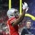 Dec 6, 2025; Indianapolis, IN, USA; Ohio State Buckeyes wide receiver Carnell Tate (17) celebrates after scoring a touchdown against the Indiana Hoosiers in the first quarter during the 2025 Big Ten championship game at Lucas Oil Stadium.