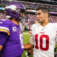 Sep 9, 2018; Minneapolis, MN, USA; Minnesota Vikings quarterback Kirk Cousins (8) talks with San Francisco 49ers quarterback Jimmy Garoppolo (10) following the game at U.S. Bank Stadium.