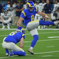 Dec 21, 2021; Inglewood, California, USA; Los Angeles Rams kicker Matt Gay (8) kicks a 35-yard field goal out of the hold of punter Johnny Hekker (6) in the second half against the Seattle Seahawks at SoFi Stadium. The Rams defeated the Seahawks 20-10.