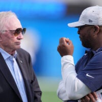 Aug 20, 2022; Inglewood, California, USA; Dallas Cowboys owner Jerry Jones (left) talks with vice president of player personnel Will McClay before the game against the Los Angeles Chargers at SoFi Stadium.