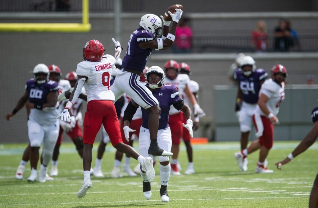 Stephen F. Austin Lumberjacks defensive back Charles Demmings (21) intercepts a pass as Jacksonville State Gamecocks take on Stephen F. Austin Lumberjacks during the FCS Kickoff at Cramton Bowl in Montgomery, Ala., on Saturday, Aug. 27, 2022. Jacksonville State Gamecocks lead Stephen F. Austin Lumberjacks 21-17.