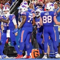 Bills wide receiver Stefon Diggs (14) and quarterback Josh Allen (17) celebrate a touchdown against the Titans at Highmark Stadium in Orchard Park, New York on Monday, Sept. 19.