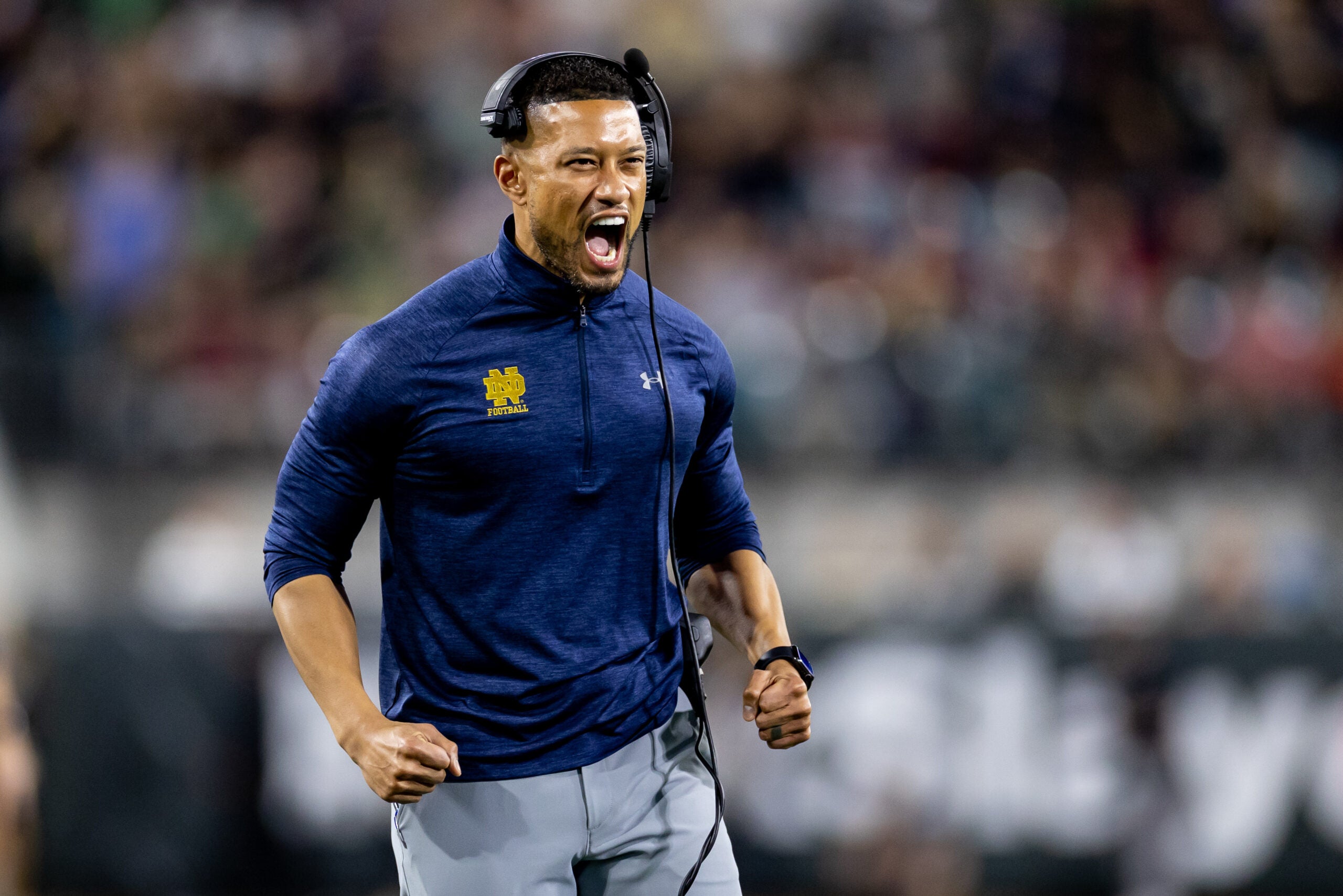 Dec 30, 2022; Jacksonville, FL, USA; Notre Dame Fighting Irish head coach Marcus Freeman reacts after a touchdown during the second half against the South Carolina Gamecocks in the 2022 Gator Bowl at TIAA Bank Field. Mandatory Credit: Matt Pendleton-USA TODAY Sports