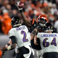 Cincinnati Bengals defensive tackle DJ Reader (98) deflects a pass by Baltimore Ravens quarterback Tyler Huntley (2) in the fourth quarter during an NFL wild-card playoff football game between the Baltimore Ravens and the Cincinnati Bengals, Sunday, Jan. 15, 2023, at Paycor Stadium in Cincinnati. The Bengals advanced to the Divisional round of the playoffs with a 24-17 win over the Ravens.